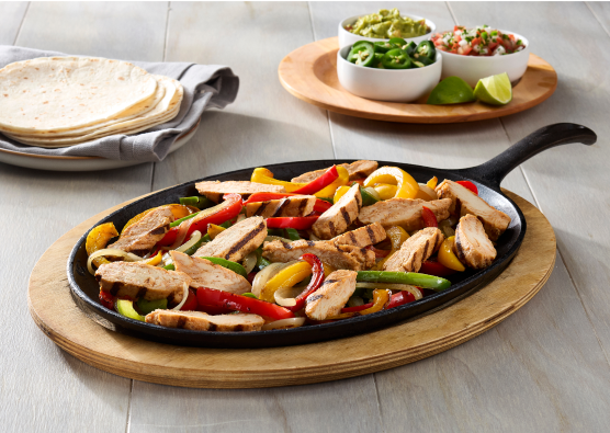 Tyson Red Label Chicken Breastg Strips Served Wood Cooked and Fajita Style 