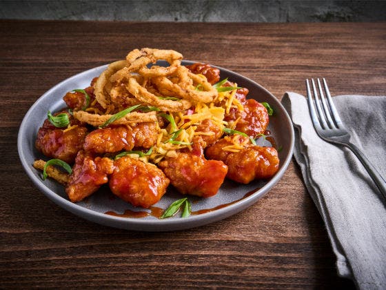 Whiskey BBQ Boneless Wings on a plate.