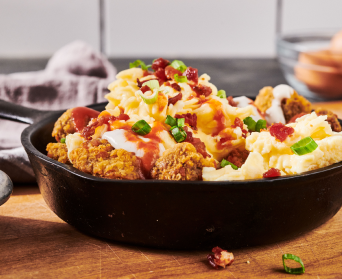Chicken tender breakfast skillet with potatoes, eggs and cheese