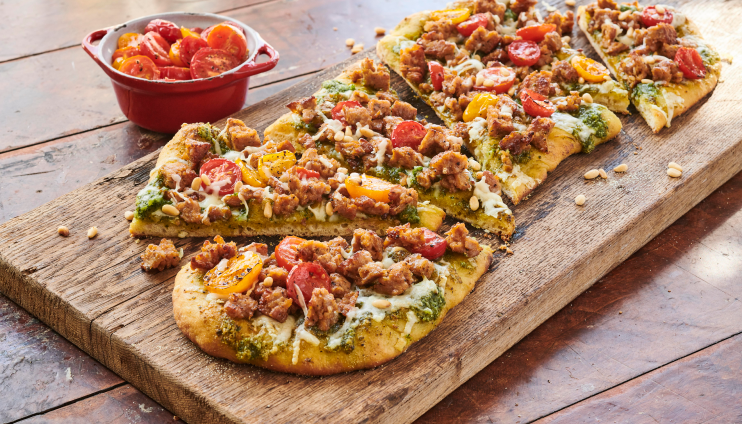 Crumbles on a Pizza That is on a Board