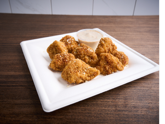 Chipotle Garlic Parmesan Rub on Chicken Nugget on a White Plate