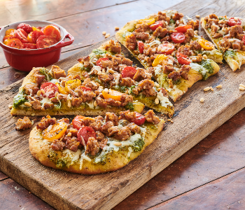 Flatbread Pizza on a Wooden Presentation Paddle Slab