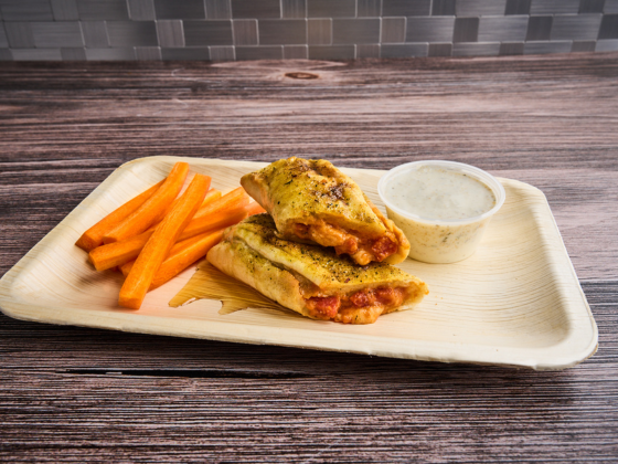 Bee Stung Stuffed Breadstick Plated with Carrots on the side