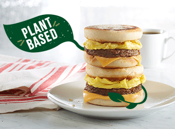 Plant Based stacked breakfast muffin sandwiches with egg, cheese and plant base patties