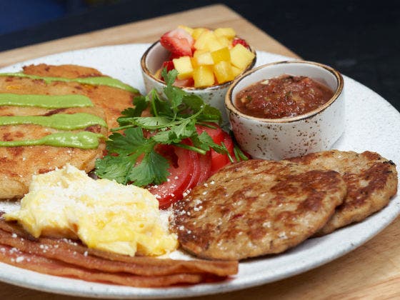 Columbian Grand Slam With Sides on a White Plate