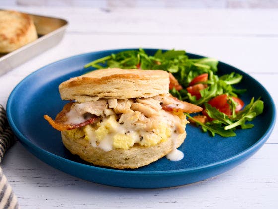 Smothered Chicken Bacon Biscuit on a plate.