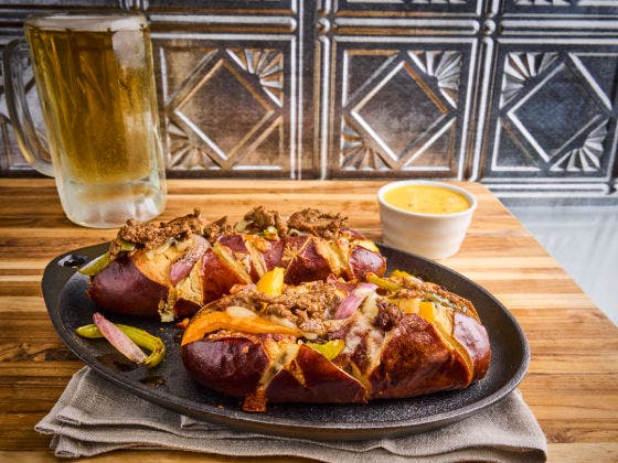 Pull Apart Pretzel Roll on a Round Baking Pan With a Beer