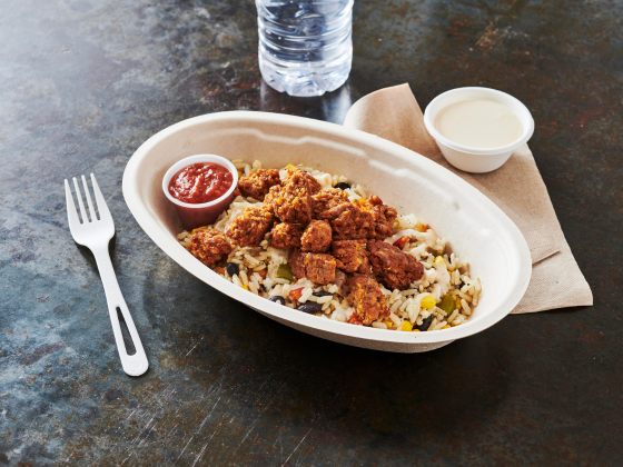 Guajillo Chicken Rice Bowl with fork and water