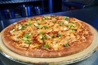 Orange Chicken Pizza recipe with Tyson® Mini Fully Cooked Breaded Whole Muscle Chicken Bites 